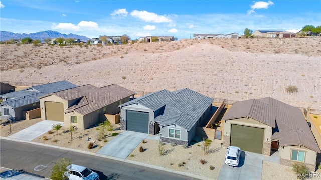 aerial view featuring a residential view and a mountain view