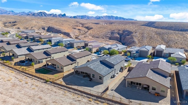 bird's eye view with a residential view and a mountain view