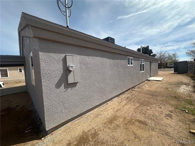 view of property exterior with stucco siding