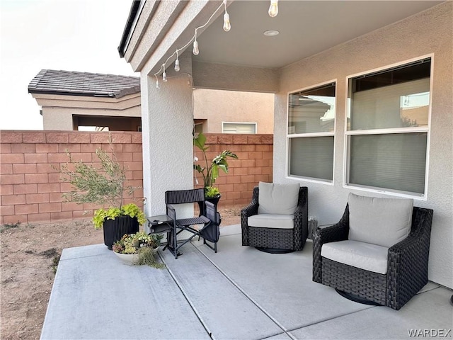 view of patio with fence