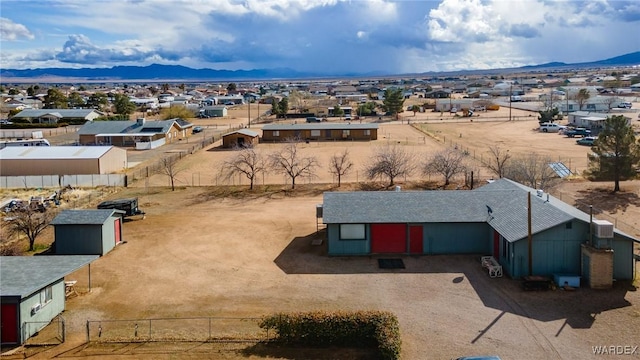 drone / aerial view featuring a mountain view and a residential view