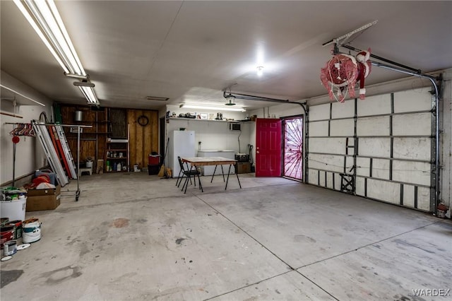 garage featuring freestanding refrigerator