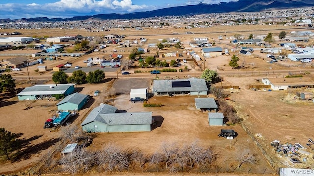 drone / aerial view featuring a mountain view