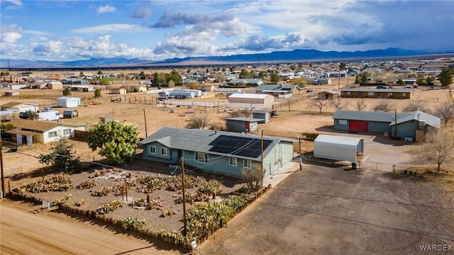 bird's eye view with a mountain view and a residential view