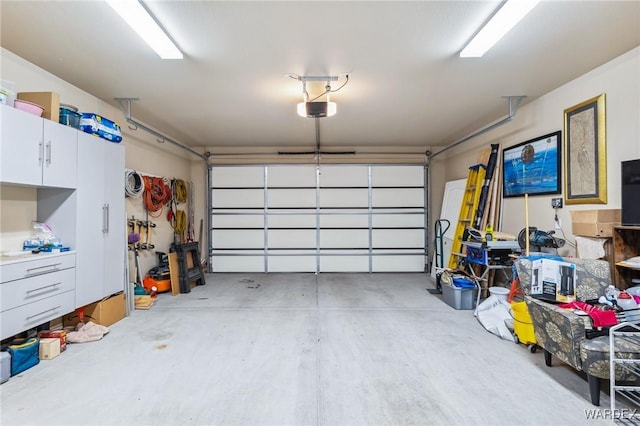 garage featuring a garage door opener