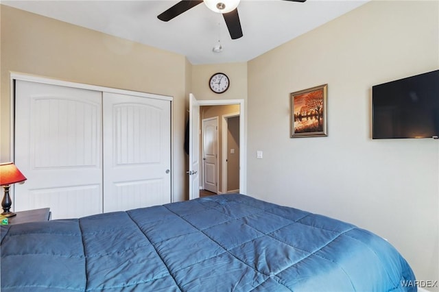 bedroom with a closet and a ceiling fan