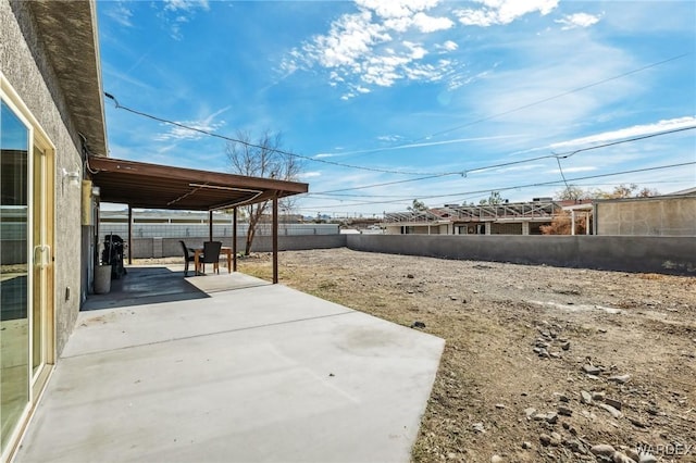 view of yard featuring a patio area and a fenced backyard