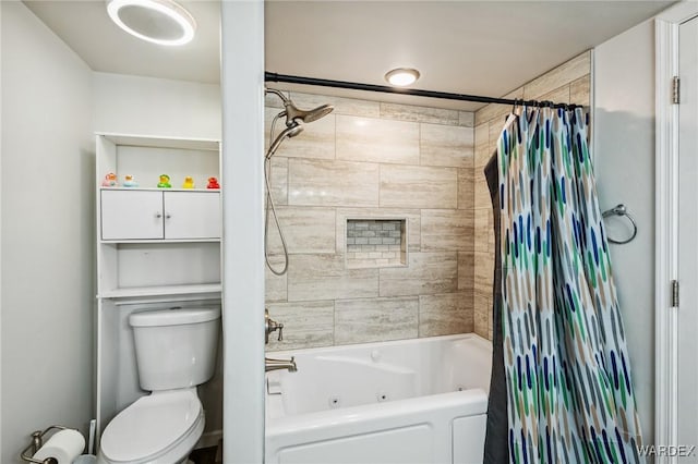 full bathroom featuring shower / bath combo with shower curtain and toilet