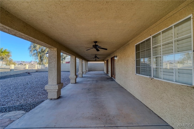 view of patio featuring a ceiling fan and a fenced backyard