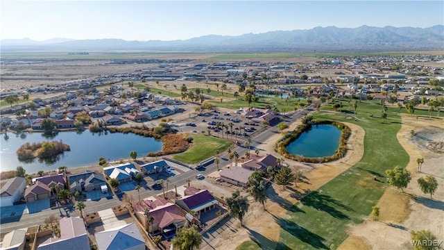 aerial view with a residential view and a water and mountain view