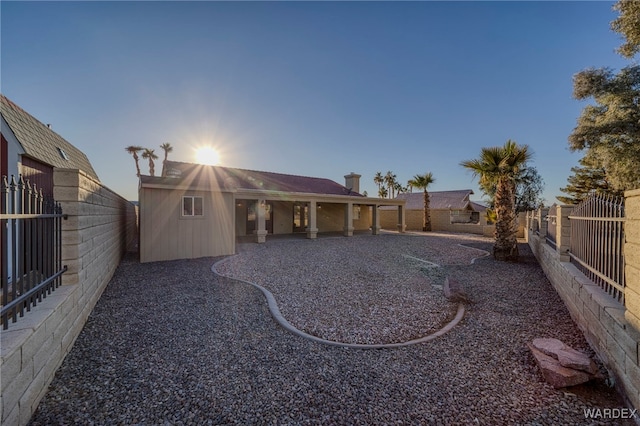 view of yard with a patio area and a fenced backyard