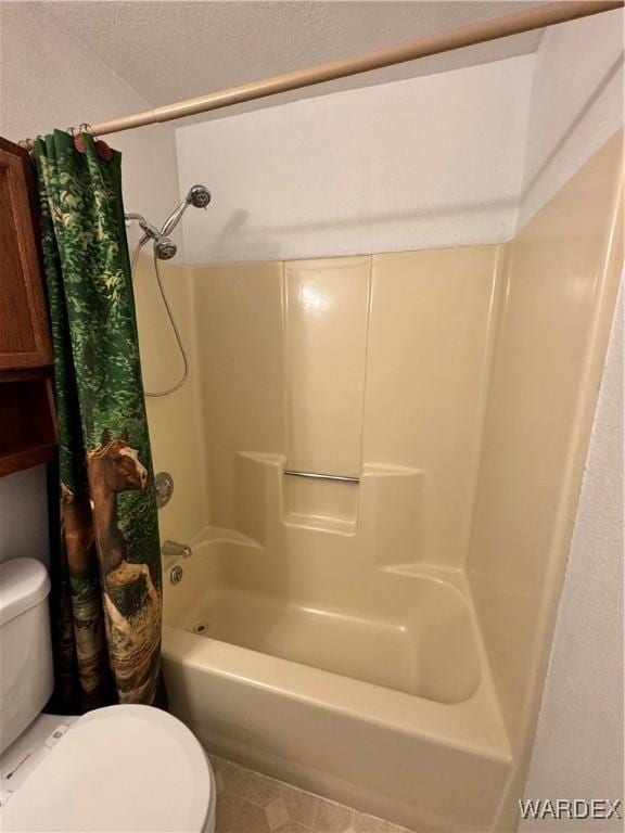 full bath with toilet and shower / bath combo with shower curtain