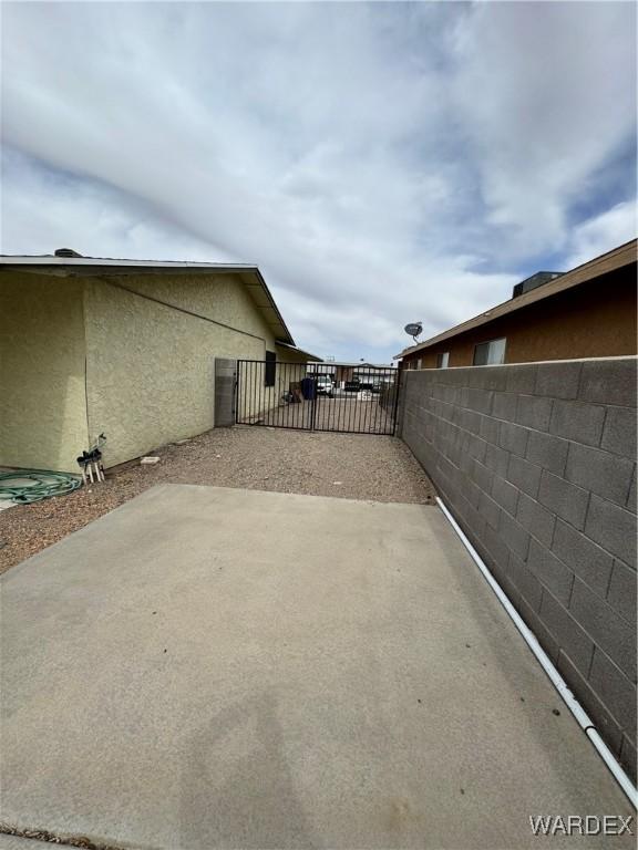 view of patio with fence