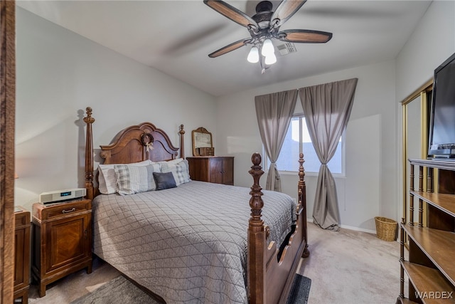 1878 E Clear Lake Dr, Fort Mohave, AZ 86426 - bedroom featuring visible vents, a ceiling fan, baseboards, and light carpet