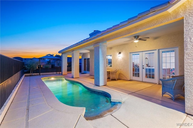 1878 E Clear Lake Dr, Fort Mohave, AZ 86426 - view of pool with a fenced in pool, a fenced backyard, a patio area, ceiling fan, and french doors