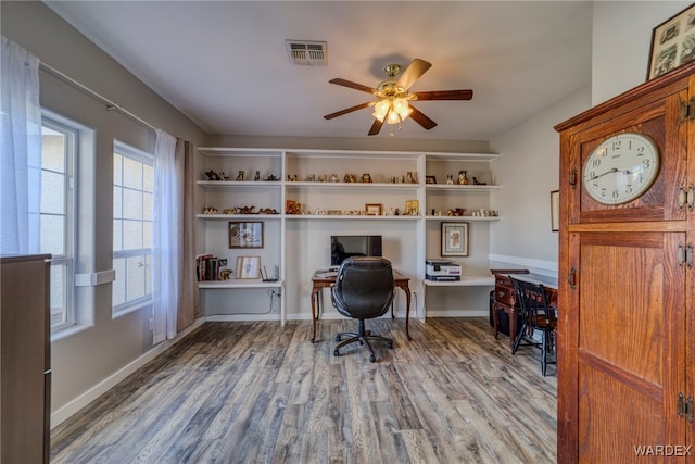 1878 E Clear Lake Dr, Fort Mohave, AZ 86426 - office space with wood finished floors, a ceiling fan, and visible vents