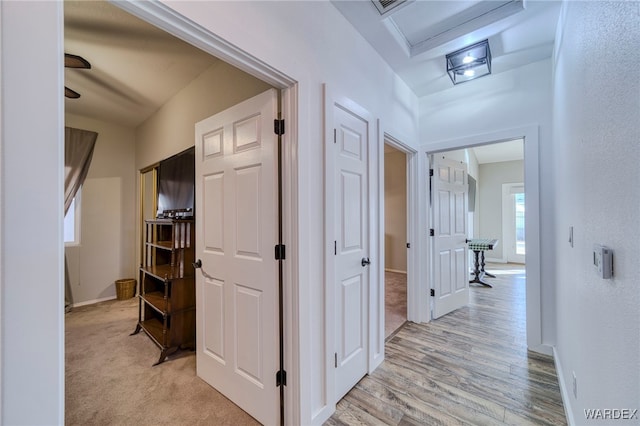 1878 E Clear Lake Dr, Fort Mohave, AZ 86426 - corridor featuring baseboards and light wood finished floors