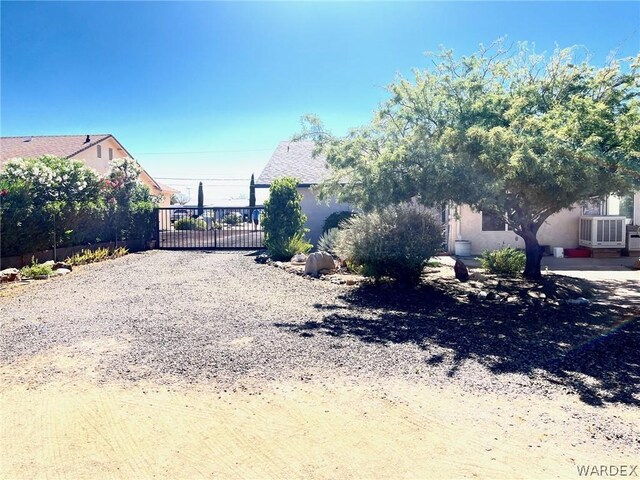 view of gate with fence