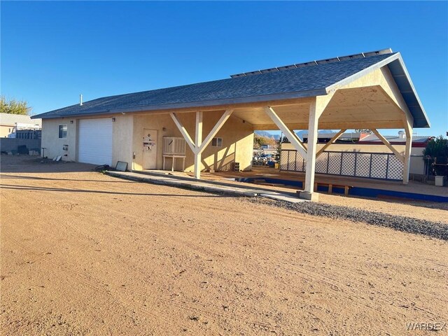 exterior space with a garage