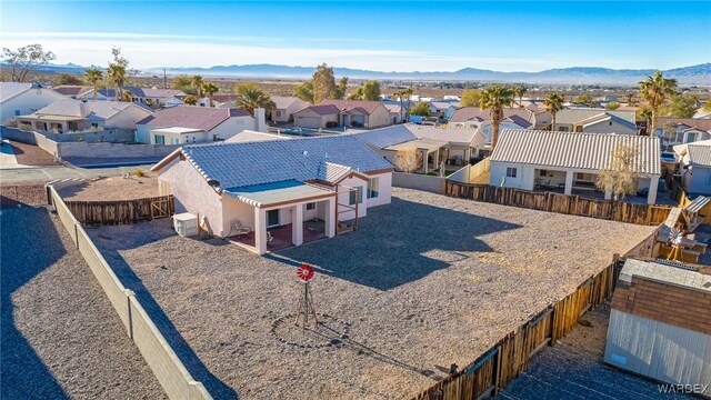 drone / aerial view with a mountain view and a residential view