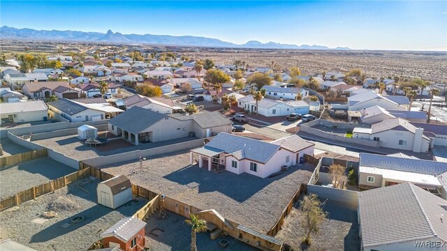 birds eye view of property featuring a residential view and a mountain view