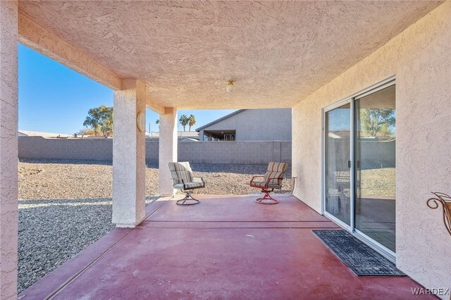 view of patio with a fenced backyard