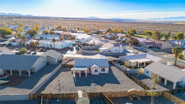 drone / aerial view featuring a mountain view and a residential view