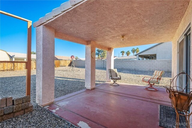 view of patio featuring a fenced backyard