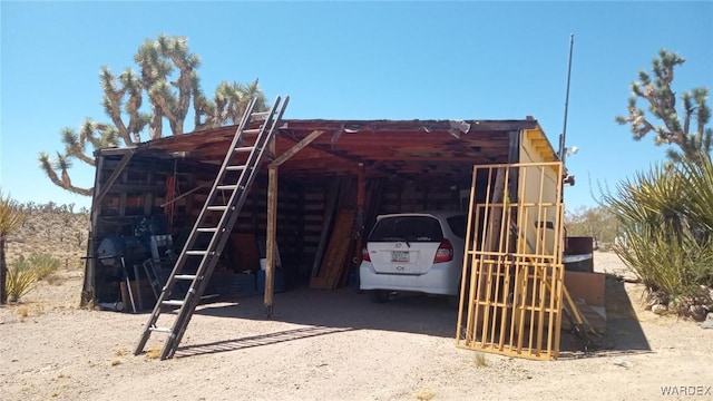 view of outdoor structure with driveway