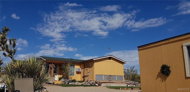 view of front of house featuring stucco siding