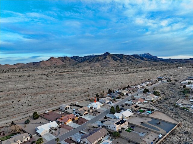 drone / aerial view with a residential view and a mountain view