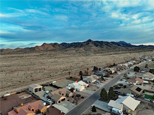 birds eye view of property with a residential view and a mountain view