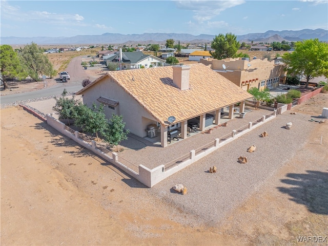 birds eye view of property featuring a residential view and a mountain view