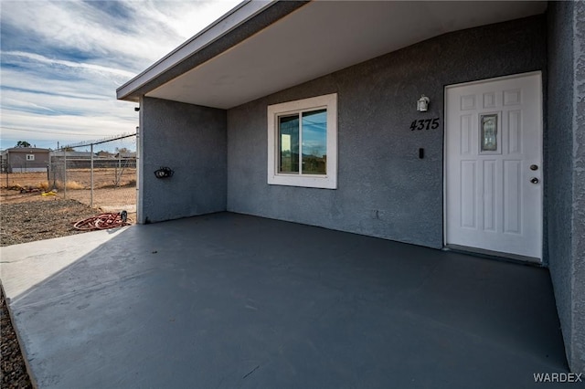 view of patio with fence