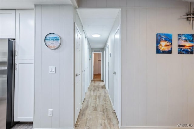 hallway with light wood-style flooring