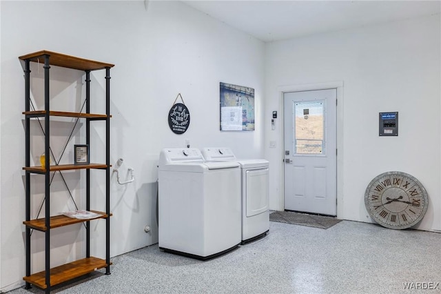 laundry area featuring laundry area and washing machine and clothes dryer