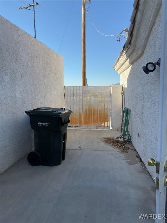 view of patio / terrace featuring fence