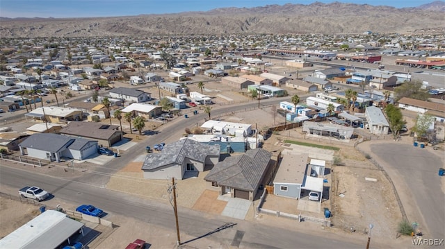 bird's eye view with a residential view and a mountain view