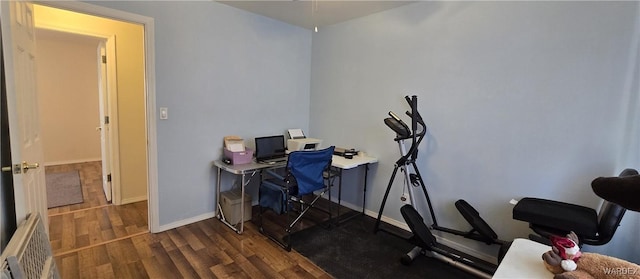 office space featuring dark wood finished floors and baseboards