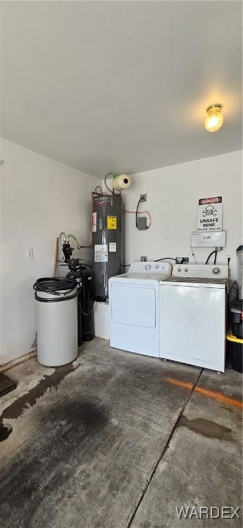 laundry area featuring independent washer and dryer, laundry area, and electric water heater