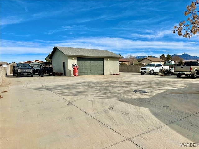 detached garage with fence