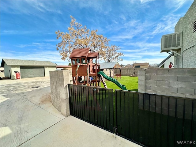 view of play area featuring fence and a yard