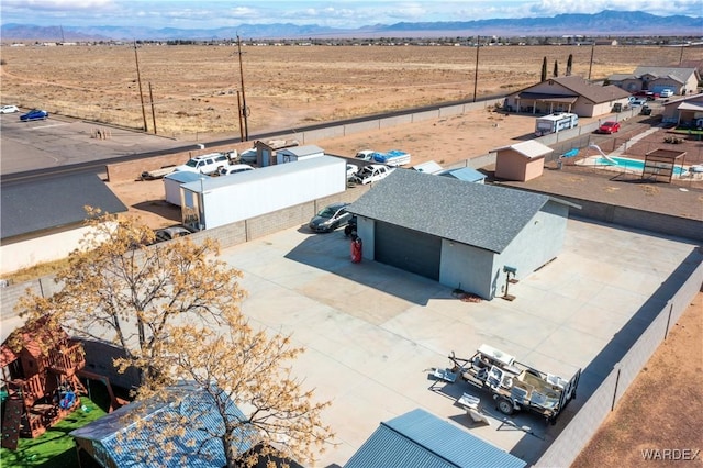 aerial view with view of desert and a mountain view