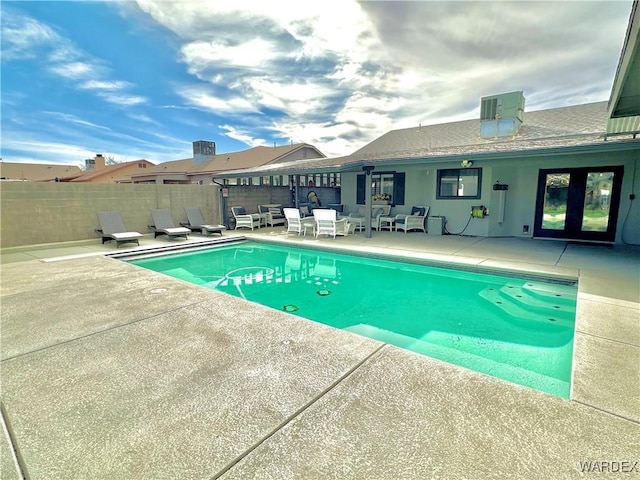 view of pool featuring a fenced in pool, a patio, and fence