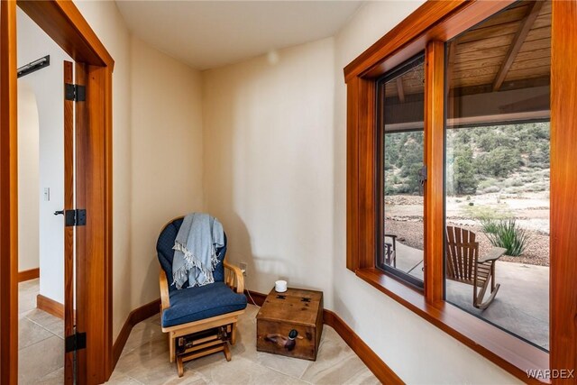 sitting room featuring baseboards