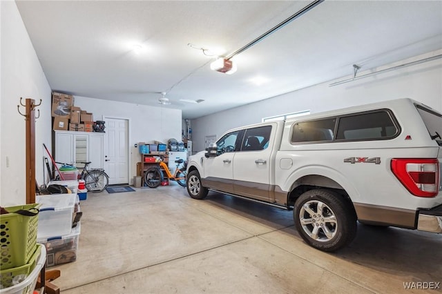 garage featuring a garage door opener