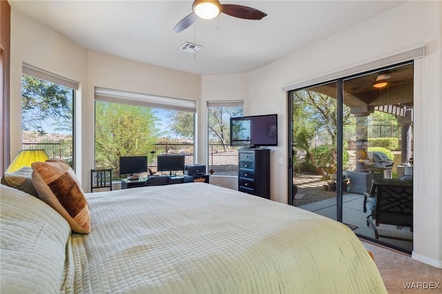 bedroom featuring access to exterior, carpet, visible vents, and a ceiling fan