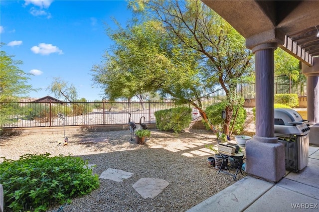 view of yard with a fenced backyard