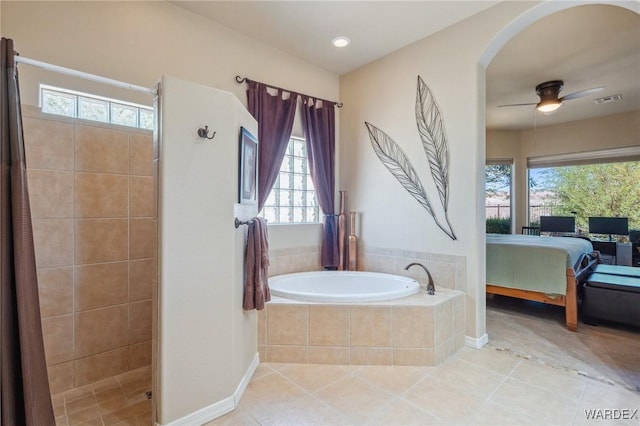 ensuite bathroom featuring ensuite bathroom, a stall shower, visible vents, and tile patterned floors