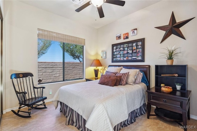 bedroom with visible vents, ceiling fan, and baseboards